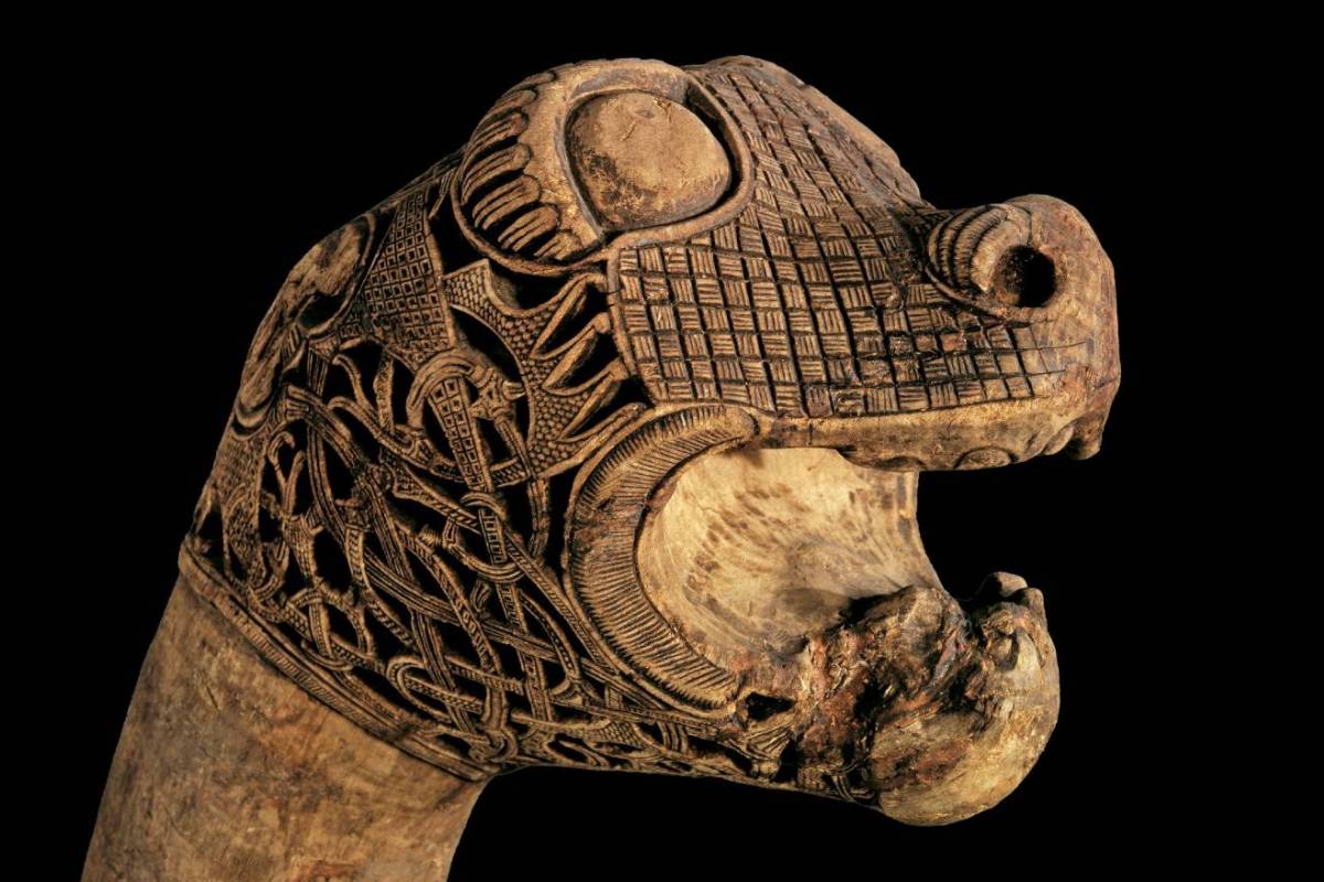 Animal-head post from the Oseberg burial in Norway. Figureheads like this were covered on ships near Iceland to avoid angering the landvættir.