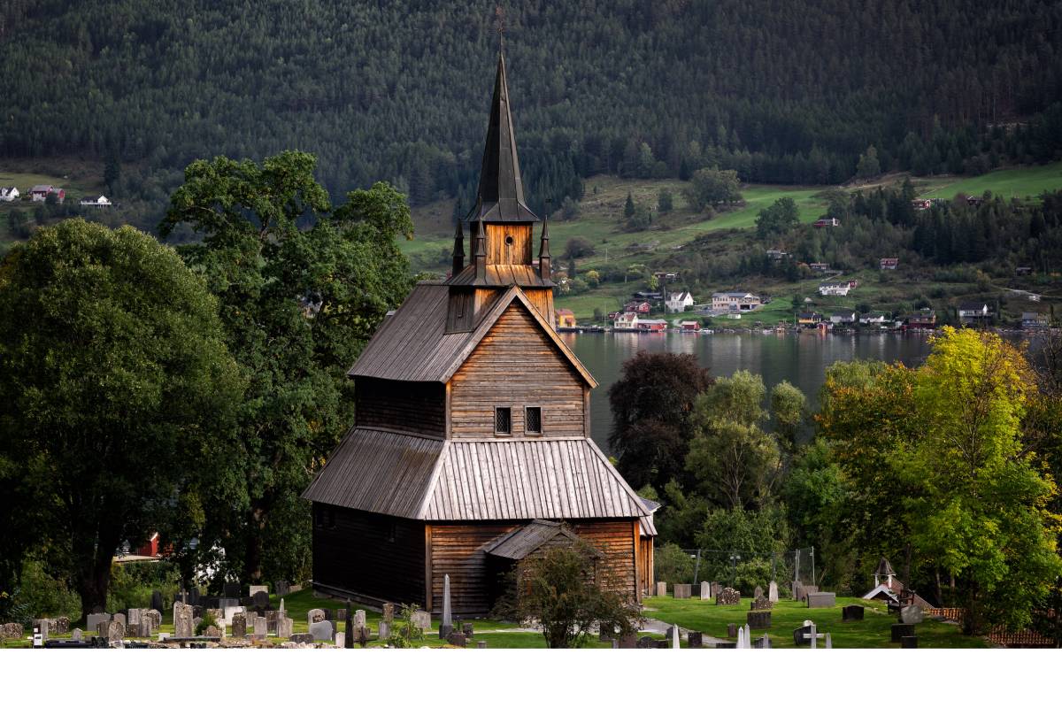 Set above the Sognefjord in Kaupanger, Vestland county, Kaupanger Stave Church preserves a rare medieval timber framework, and its interior is defined by a nave supported by 22 staves.