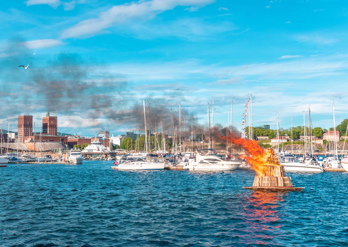 In 2023, Sankthans falls on a Friday. Pictured is a bonfire floating on the water in Oslo, Norway.