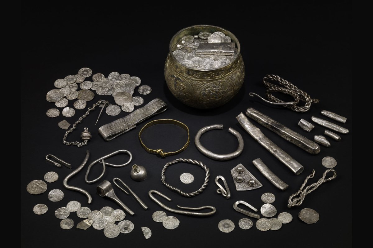 Silver coins, hacksilver, and ornaments from the Vale of York Hoard show how Viking raiding generated wealth that fed into trade networks.