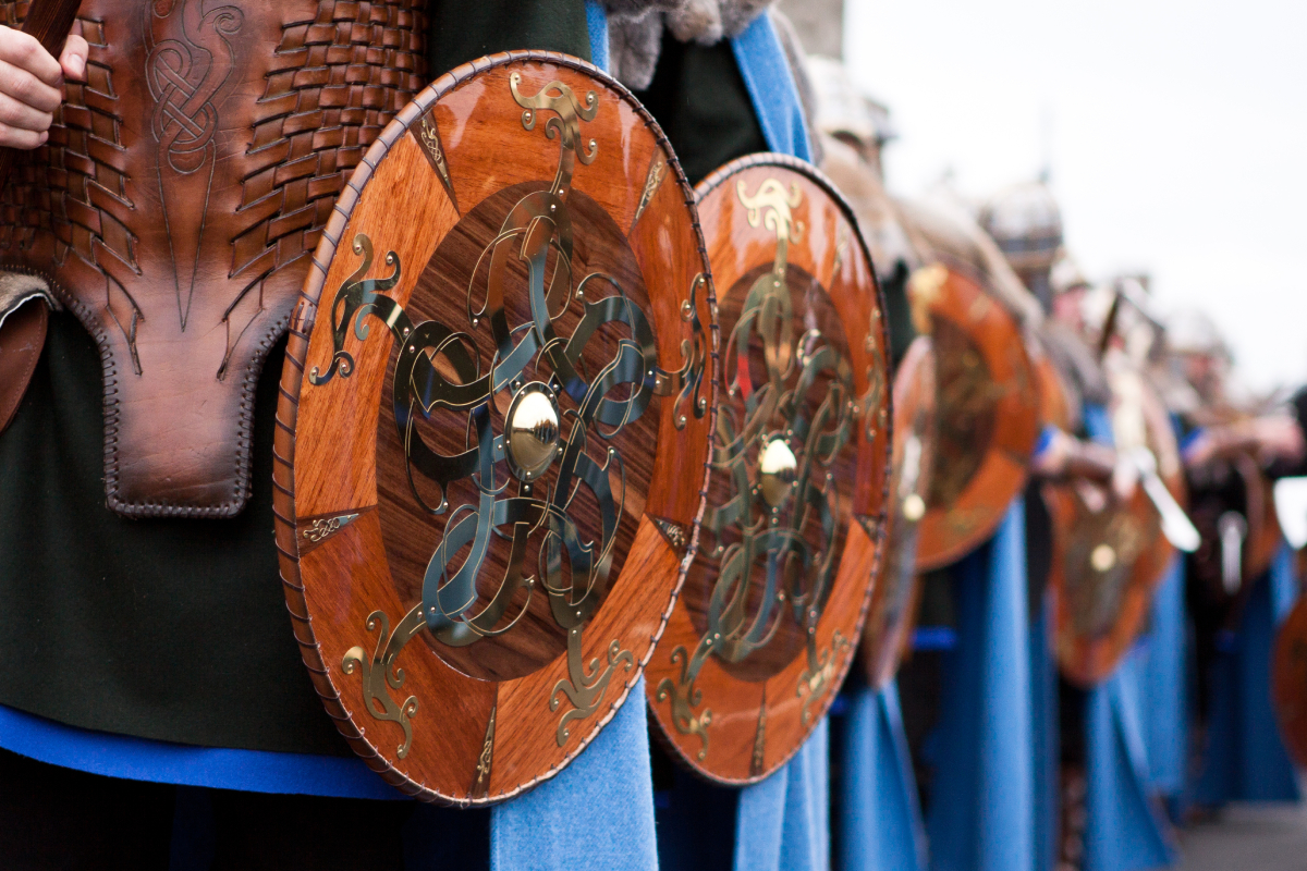 From the torchlit processions of Up Helly Aa to Texas reenactments, Jonathan Bennett examines the top Viking festivals across the US, UK, and Scandinavia.