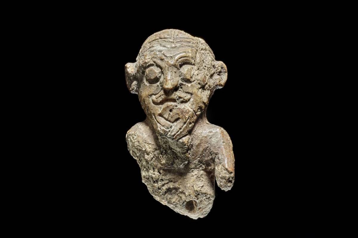 The Flygstad figurine, carved from walrus tusk around 950–1000 CE and discovered in 1796 near Oslo, is interpreted as a Viking Age gaming piece connected to the board game Hnefatafl.
